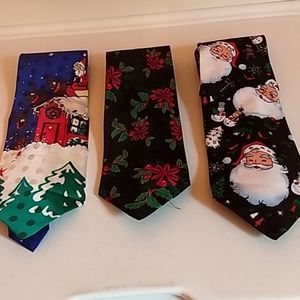3 Christmas themed neckties. Santa, mistletoe